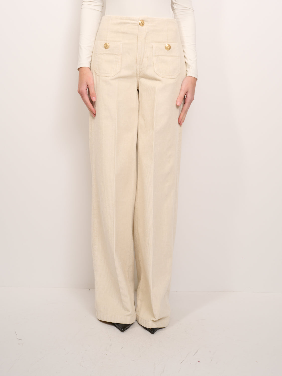 ASOS DESIGN - Top a fascia nero con bottoni oro in coordinato | ASOS ASOS DESIGN - Top a fascia nero con bottoni oro in coordinato | ASOS